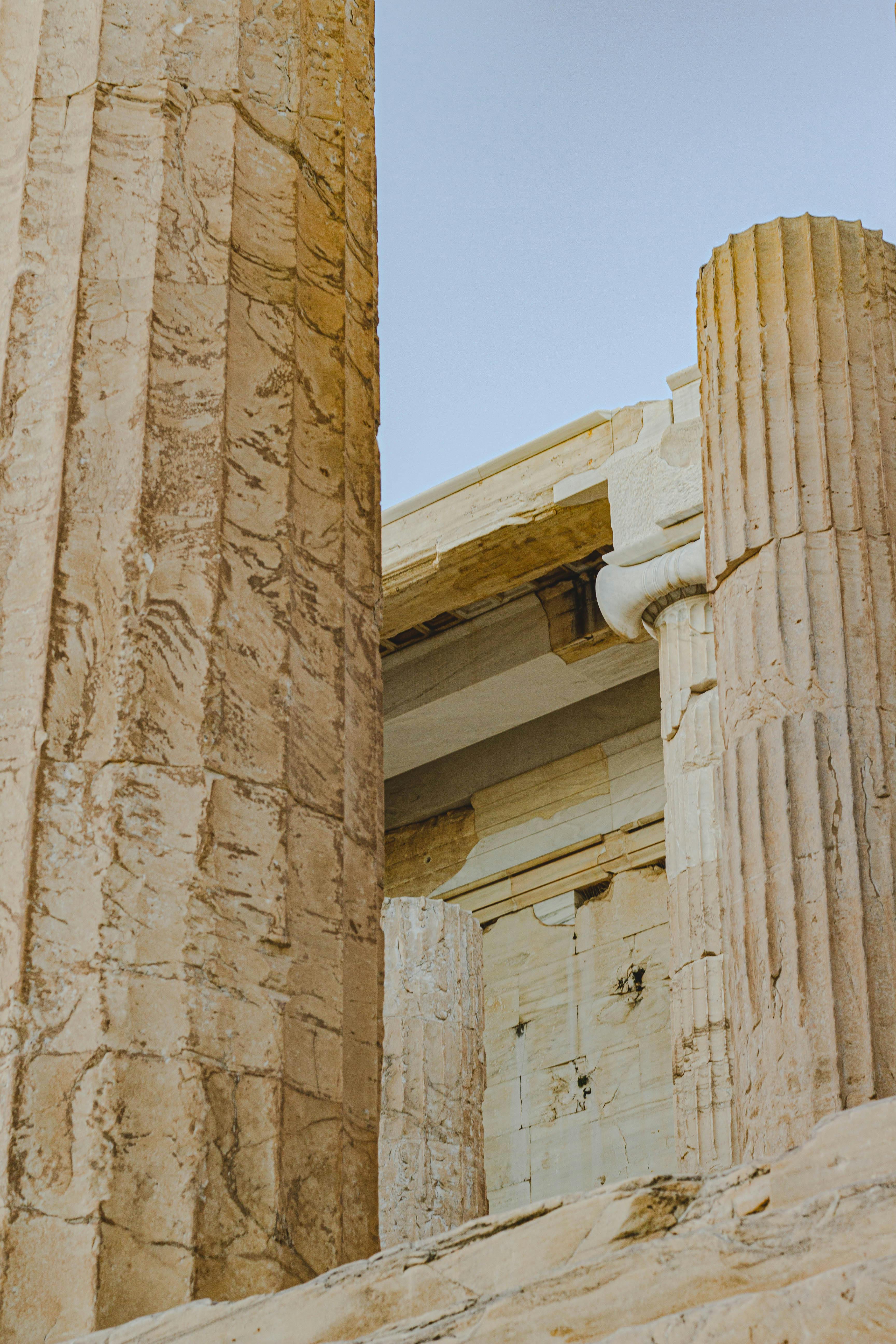 Close-up of ancient Greek temple columns showcasing classical architecture.