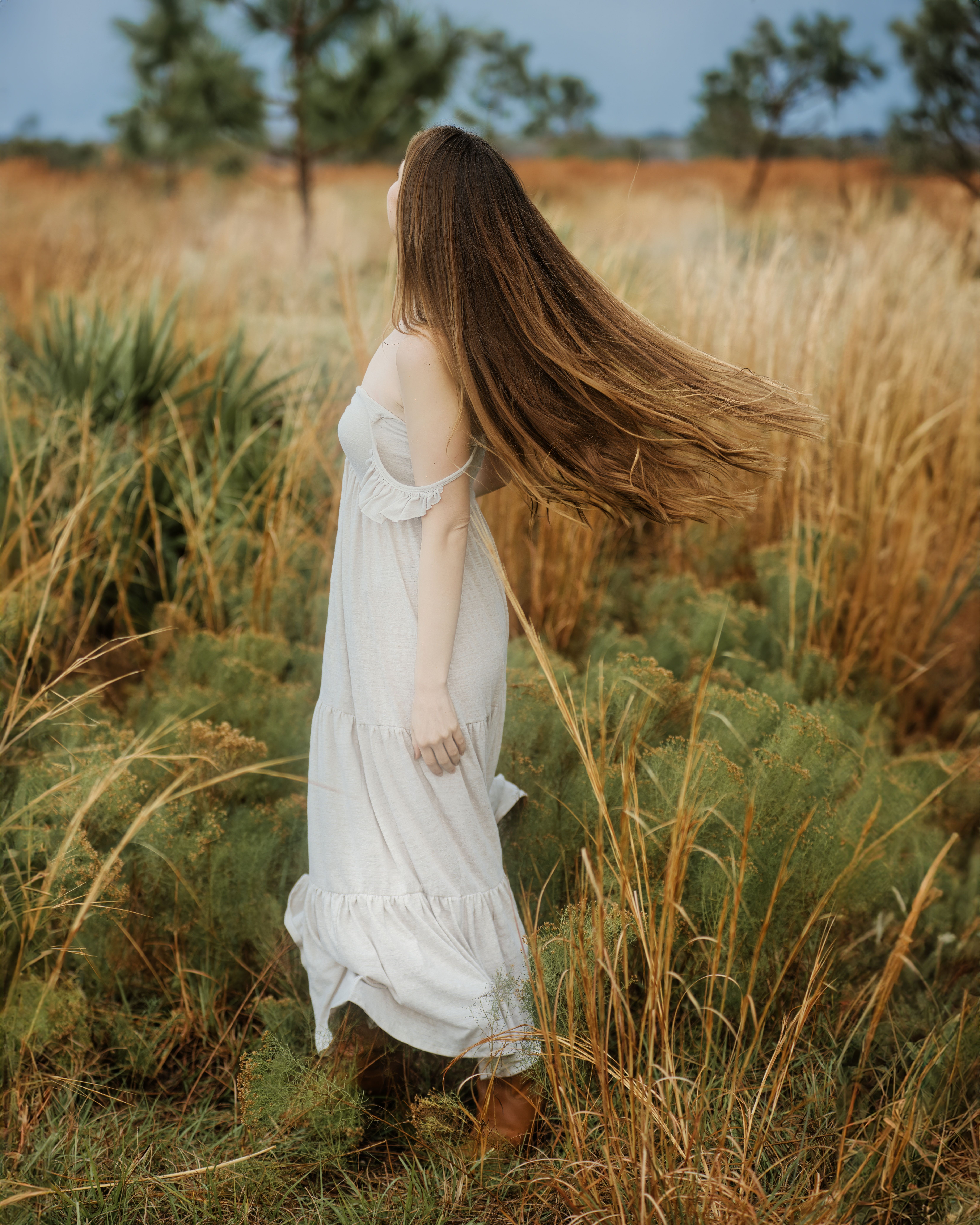 Woman in White Dress and with Long Hair Standing on Field · Free Stock ...