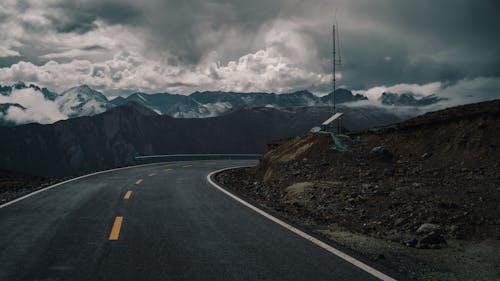 Empty Road Turn in Mountains