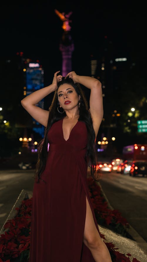 Woman in Red Dress in Mexico City at Night