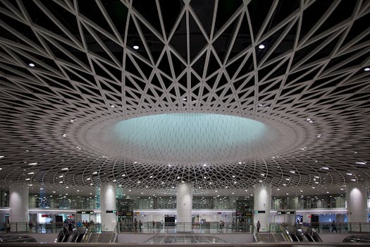 Sleek airport interior featuring a stunning geometric ceiling with dynamic lighting.