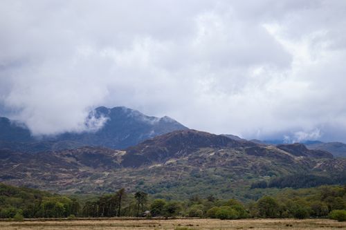 Free Scenic view of mountains under cloudy skies in rural Wales, capturing natural beauty. Stock Photo