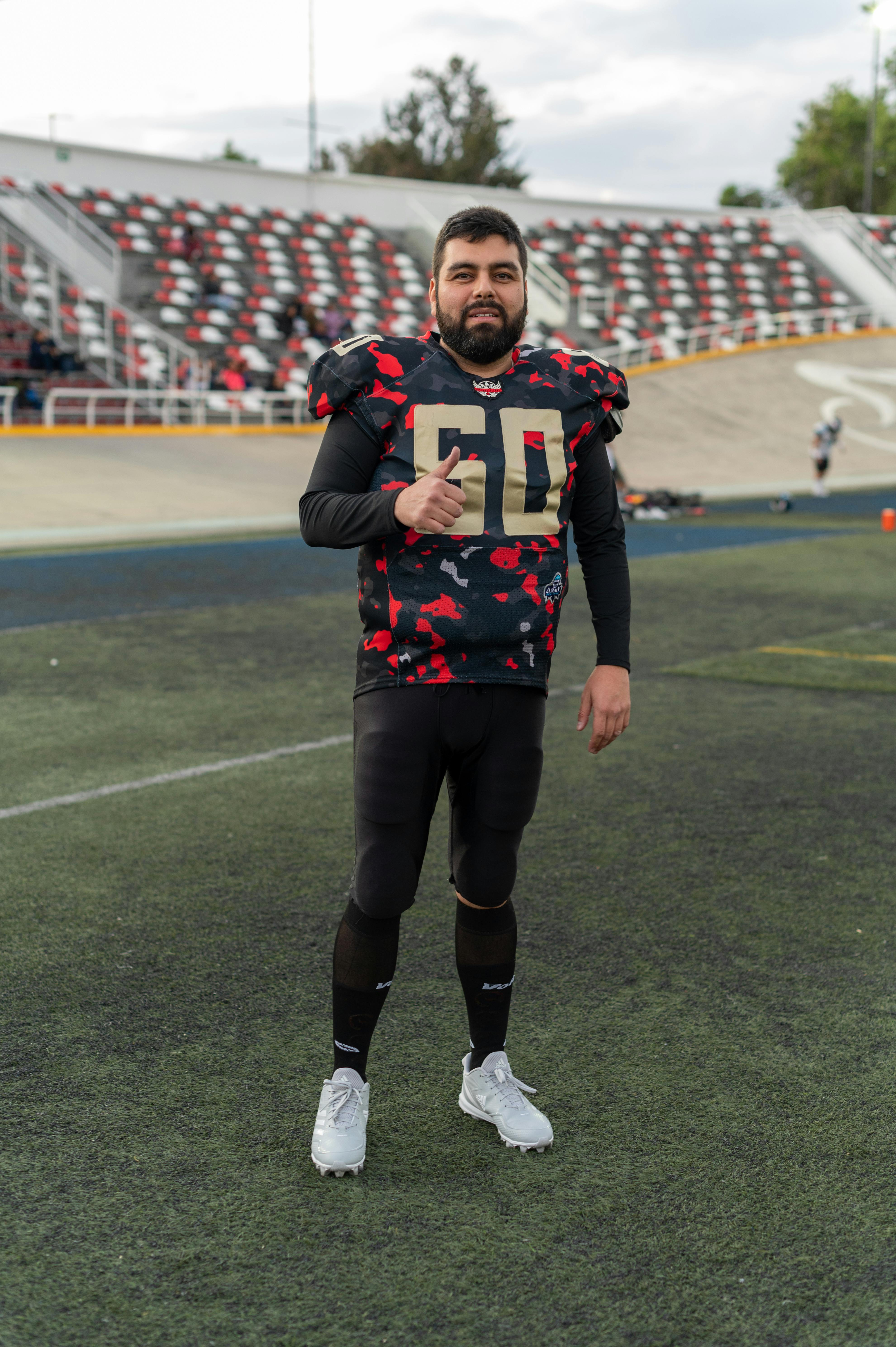 man in a american football uniform with the number