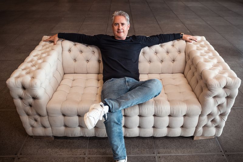 Designer furniture and material samples in a Miami interior design studio