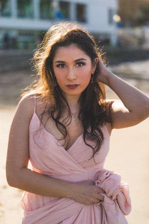 Woman in Pink Dress with V-Neckline