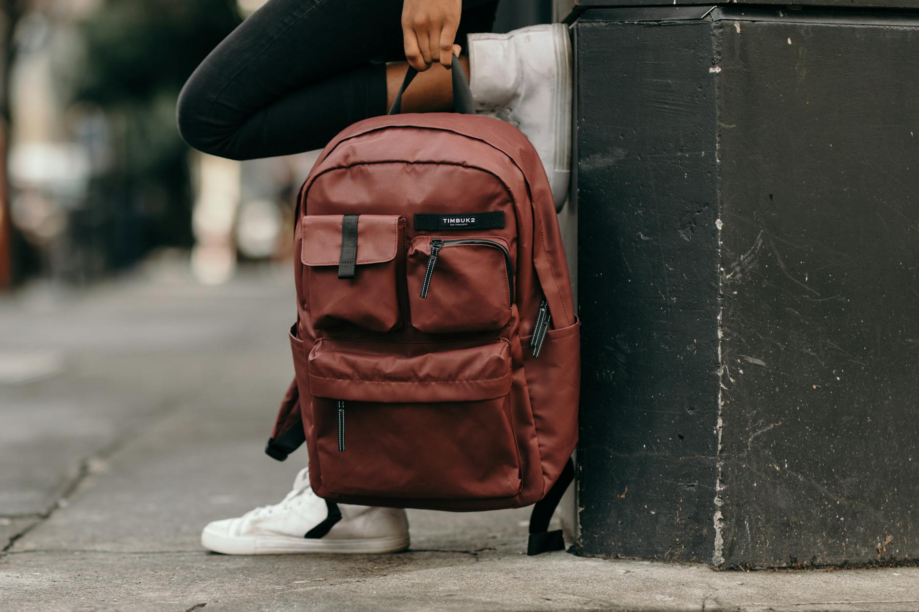 someone holding a back pack