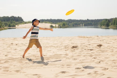 Photos gratuites de amusement, frisbee, garçon