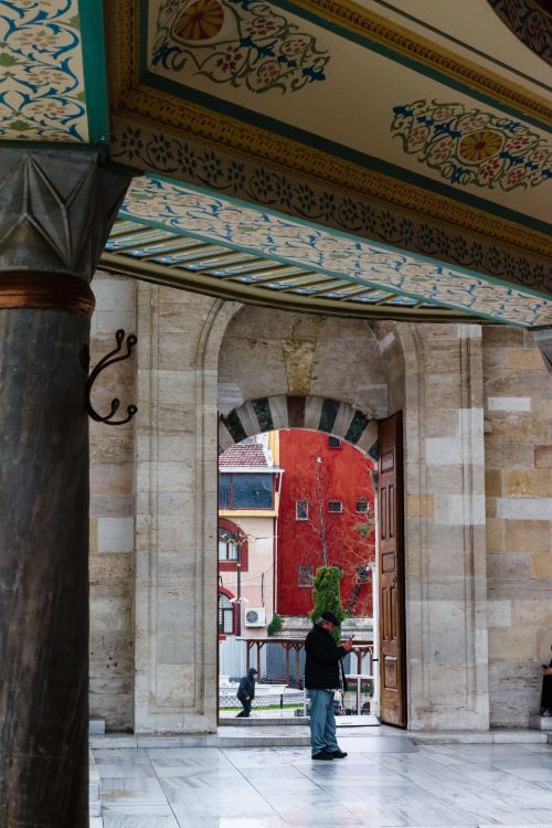 Free Interior view of a mosque entrance showcasing exquisite Islamic architecture and design. Stock Photo