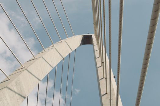 Low angle view of Thu Thiem 2 Bridge cables against a clear sky in Ho Chi Minh City.