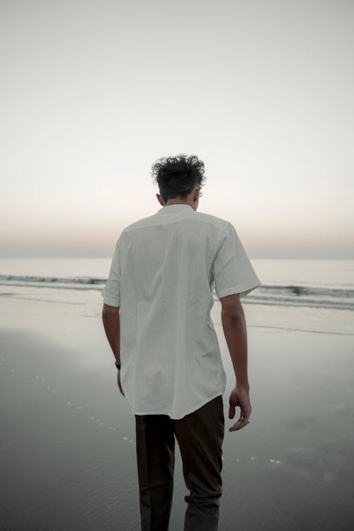 Back View of Man in White Shirt