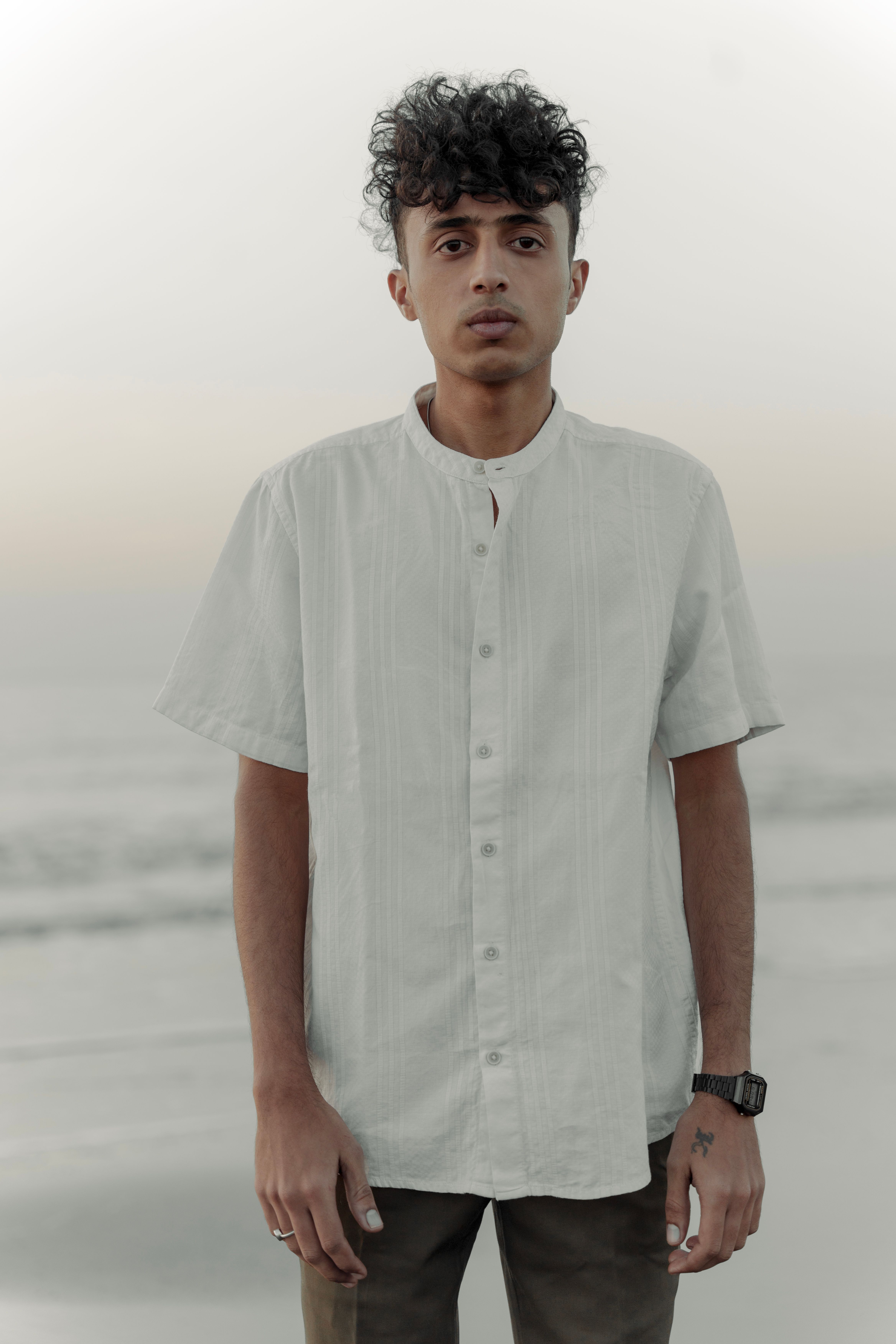 Portrait of Man in White Shirt · Free Stock Photo