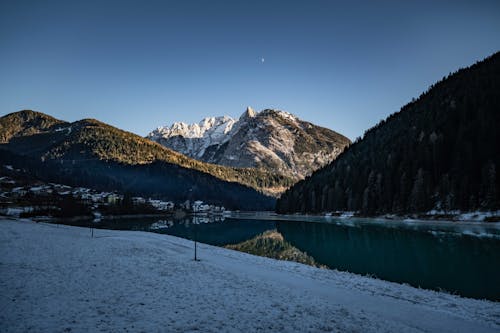 Lake and Village in Mountains