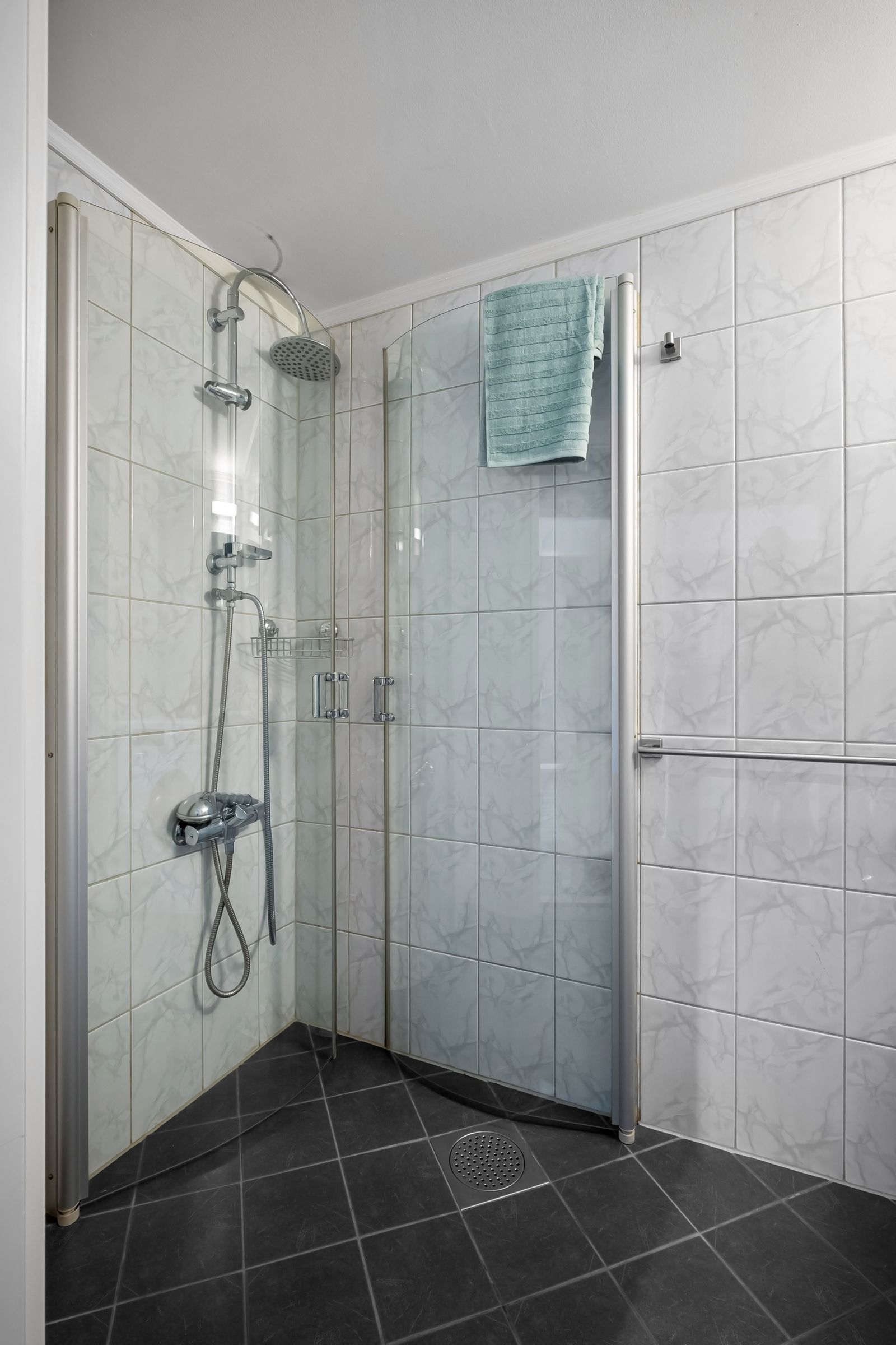 Contemporary glass shower in a remodeled bathroom