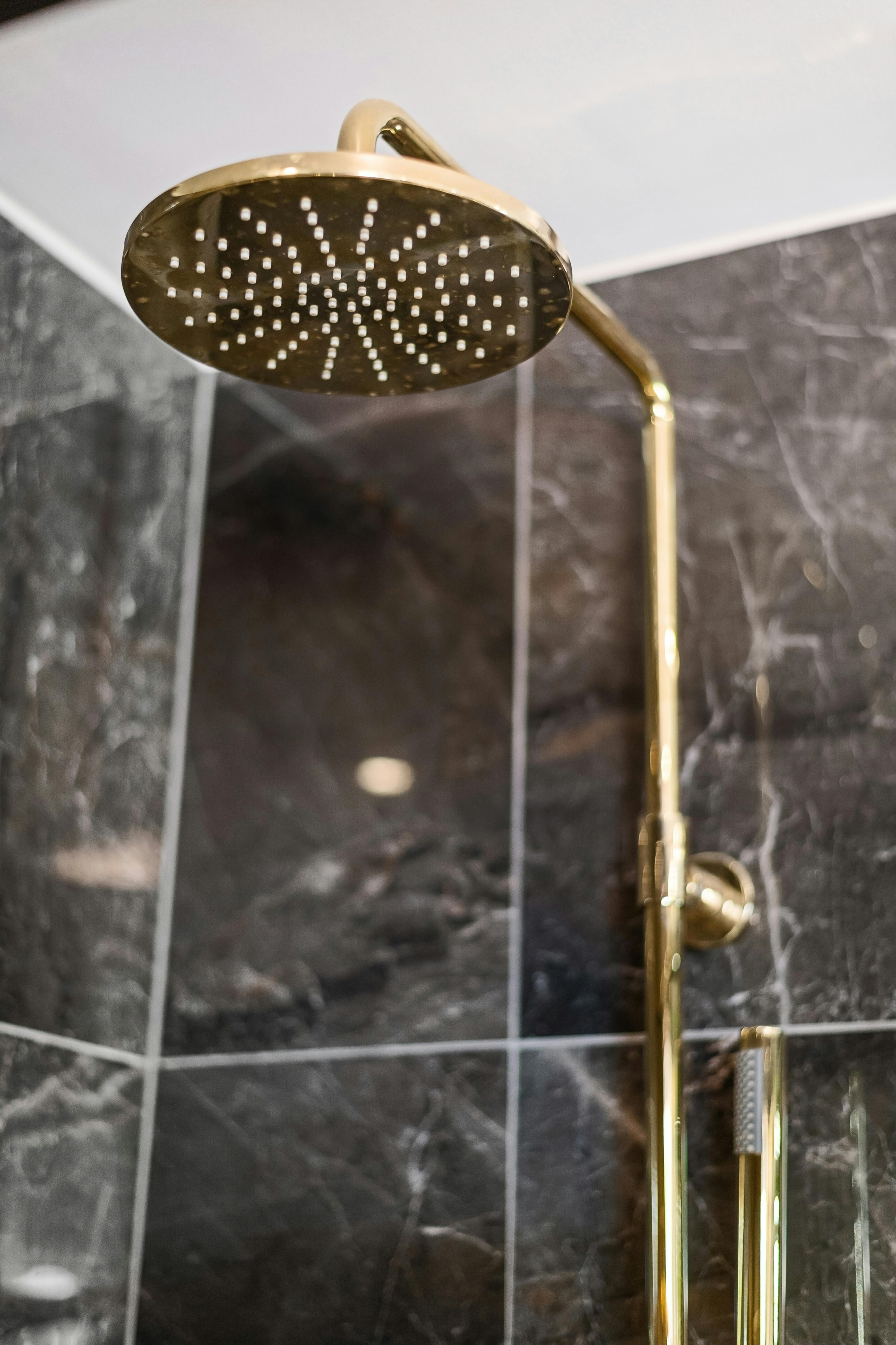 Elegant bathroom featuring natural stone and sophisticated ventilation
