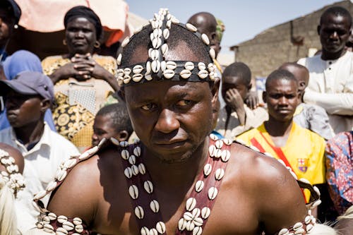 Man Wearing Tribal Costume with Shells 