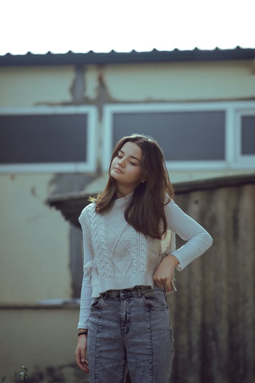 Woman Standing in White Clothes