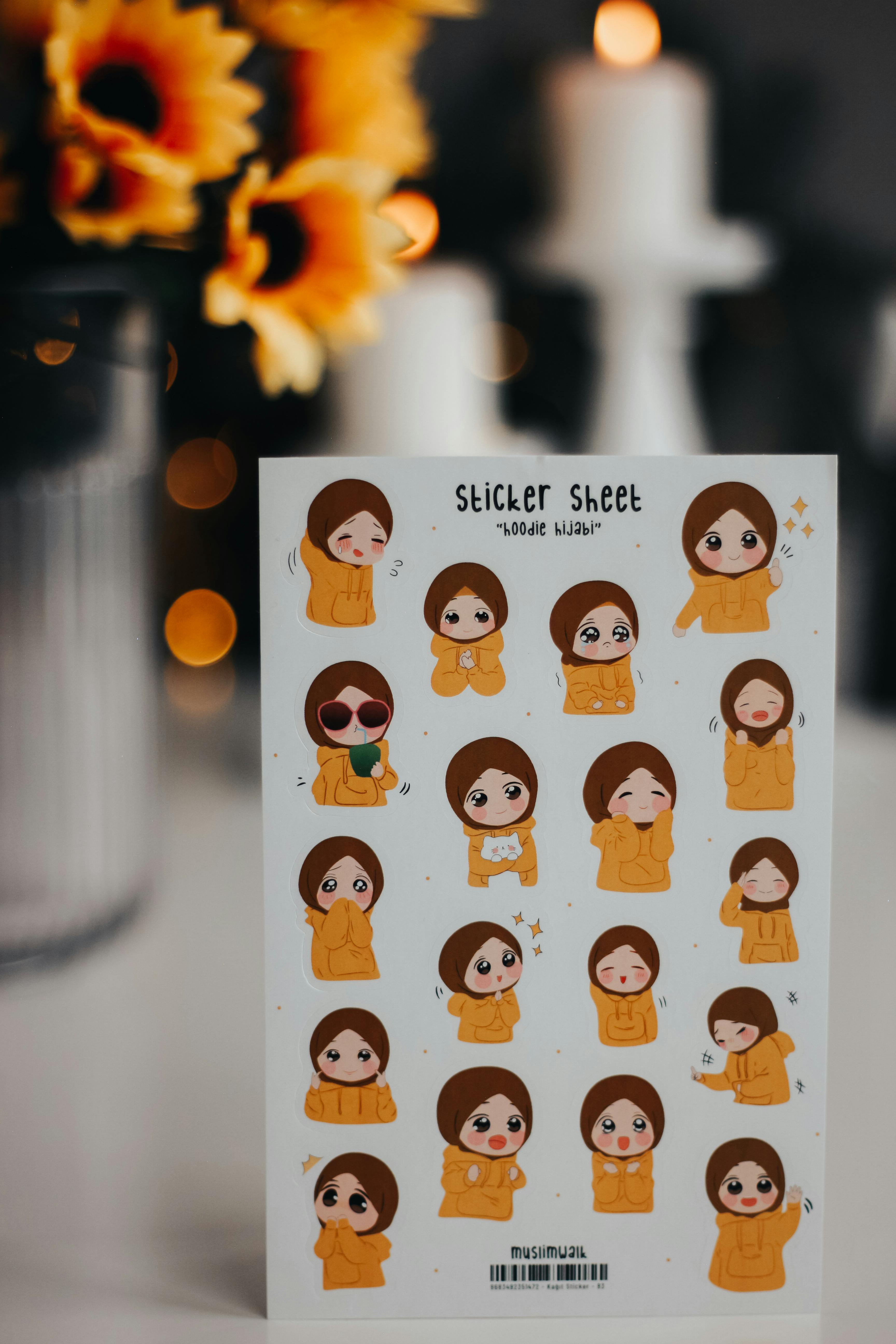 stickers with a cartoon character wearing a hijab and sunflowers in a vase