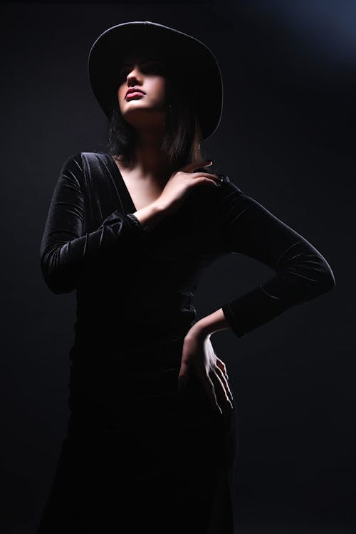Model in Velvet Dress and Hat