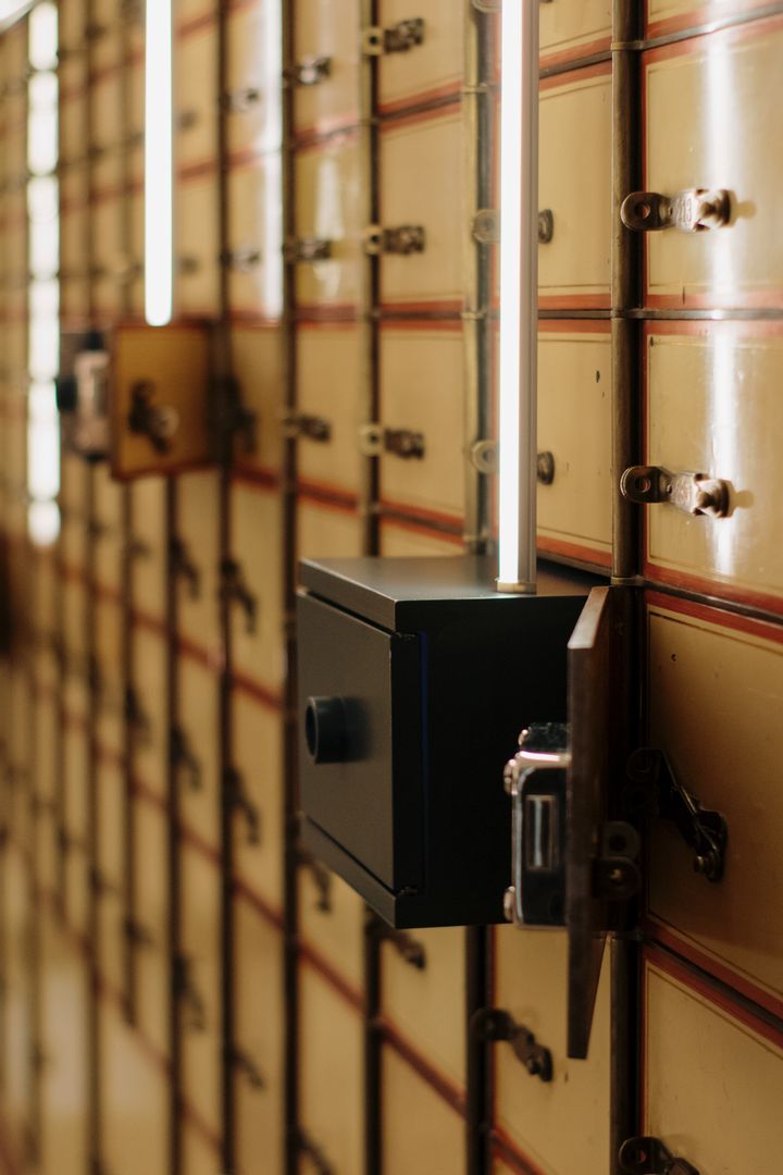 Vintage safe deposit boxes with one drawer open
