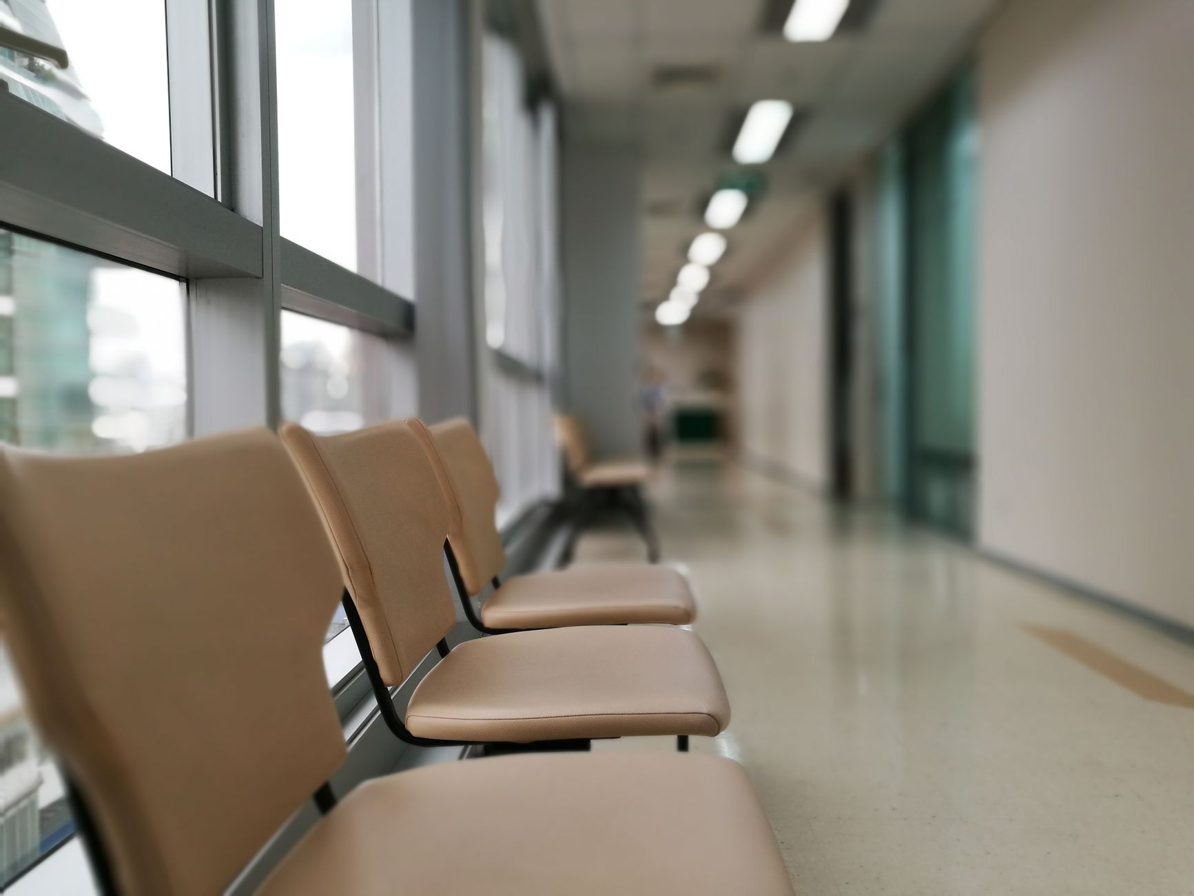 Bright, clean interior of a modern Korean hospital lobby, showcasing advanced design and patient comfort.