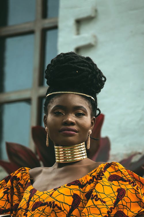 Model in Gold Neck Rings