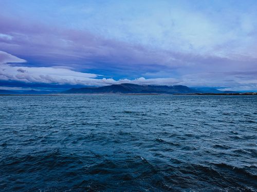 Free Stunning twilight over Reykjavík's coastline with a scenic view of the North Atlantic Ocean. Stock Photo