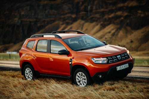 Red Dacia Duster Left on the Roadside