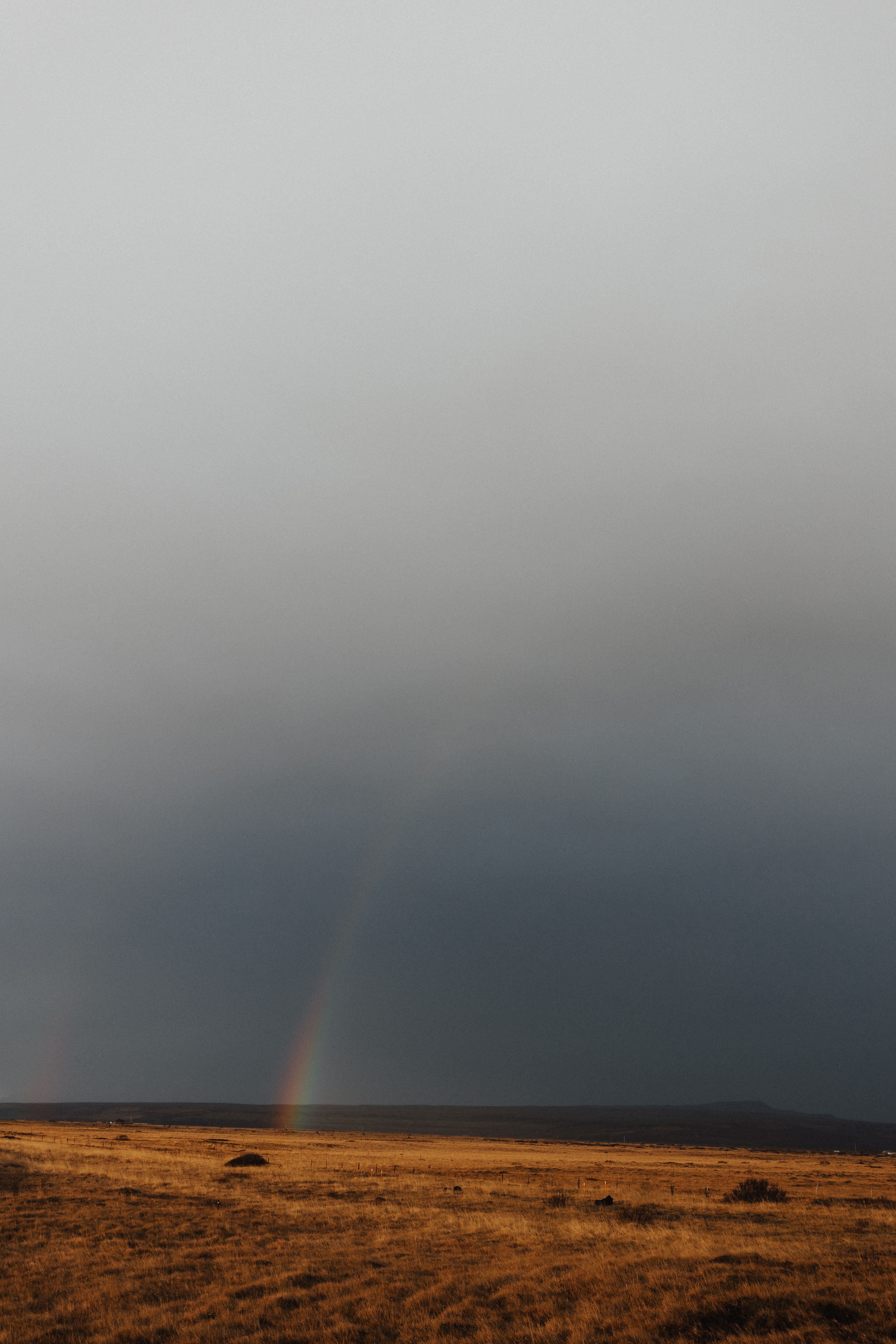 Rain Cloud and Rainbow over Plains · Free Stock Photo