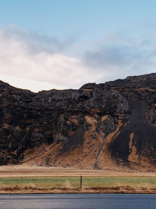 Free Dramatic eroded hills in Rangárþing eystra, Iceland, under a cloudy sky. Stock Photo
