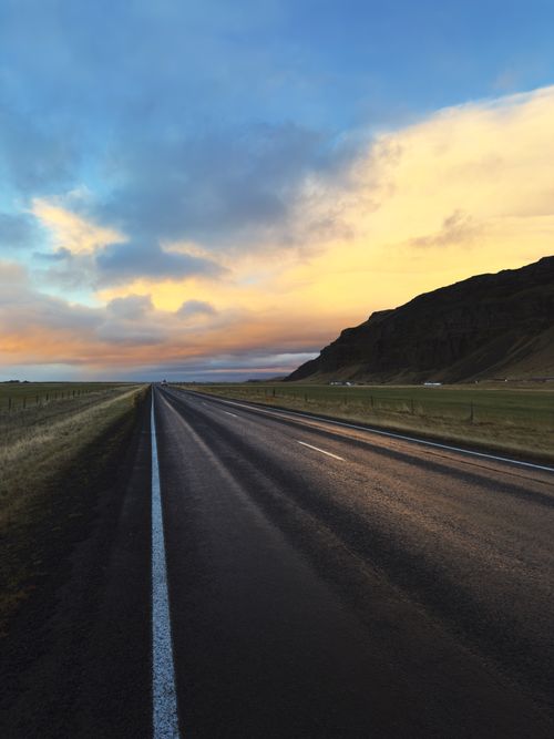Free Beautiful road view at twilight against stunning Icelandic backdrop, perfect for tranquility and travel themes. Stock Photo