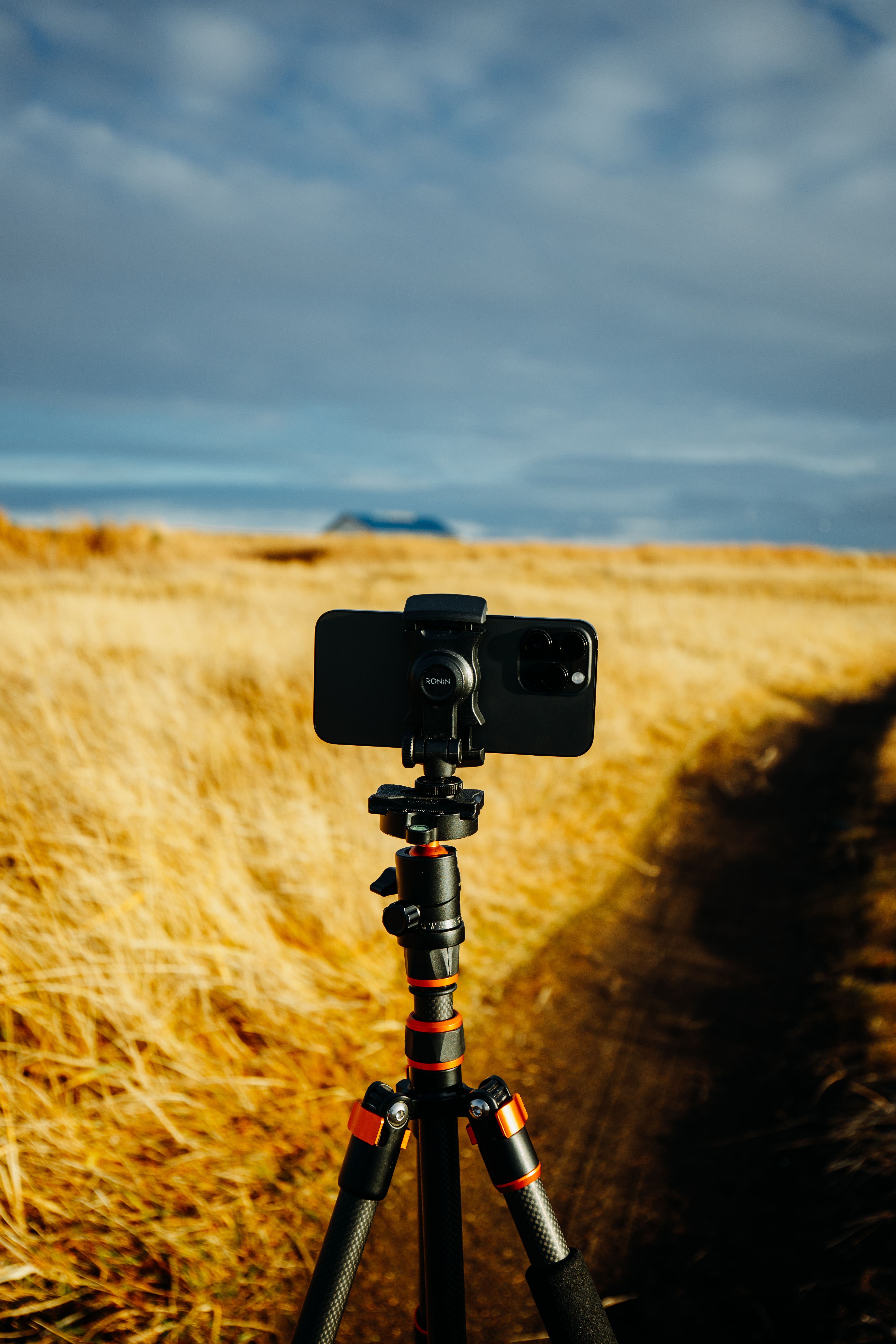 Black Dslr Camera Mounted on Black Tripod · Free Stock Photo