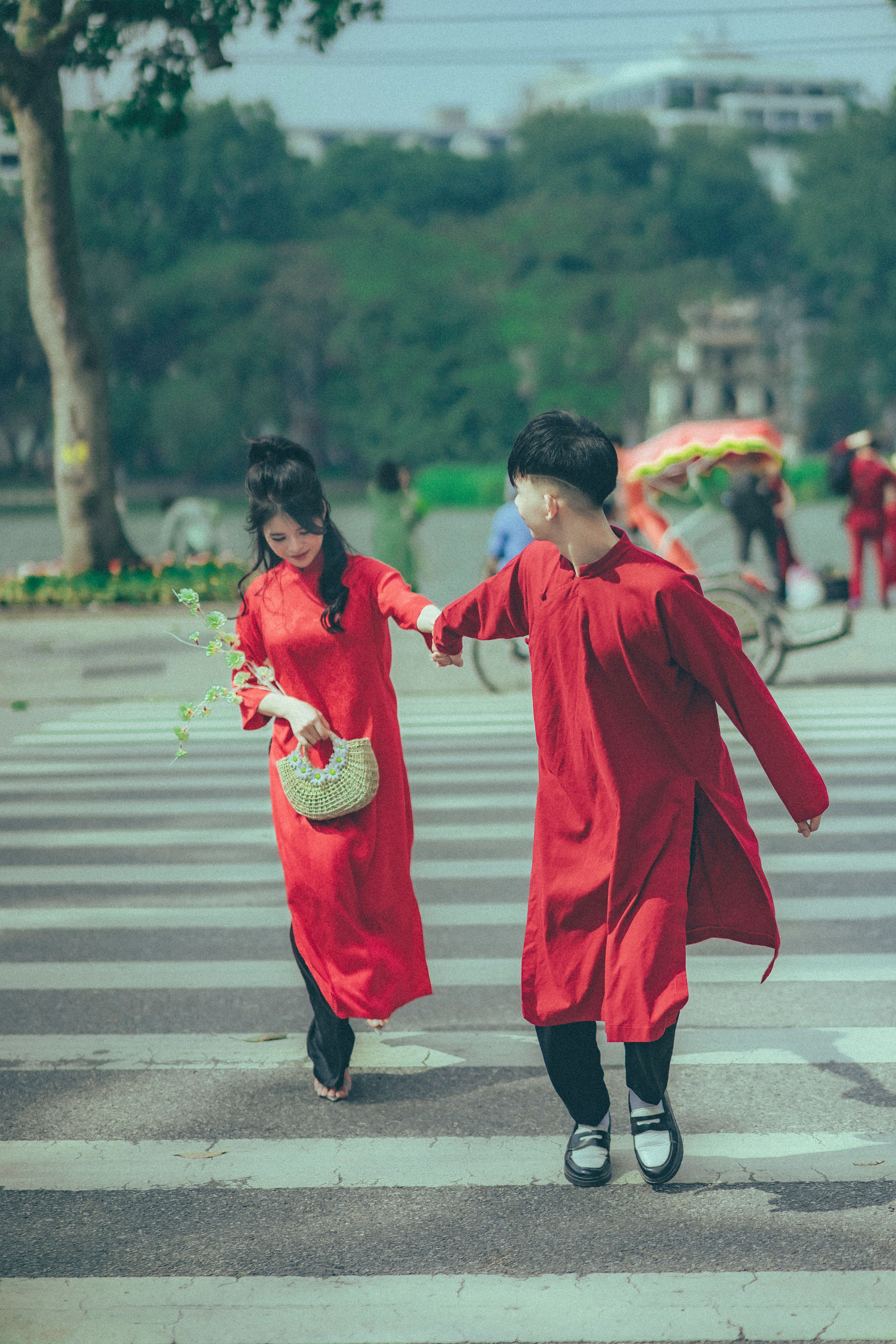 Couple Wearing Traditional Clothing on City Street · Free Stock Photo