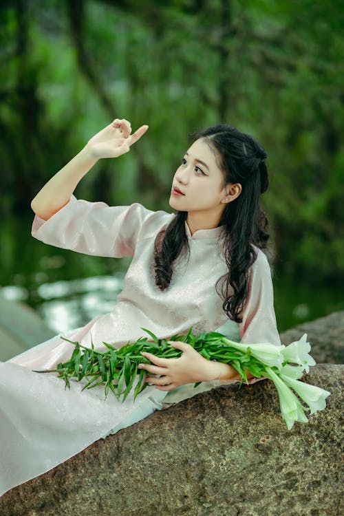 Foto profissional grátis de Ásia, cultura, deitado