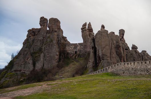 Explore the historic Belogradchik Fortress surrounded by unique rock formations in Bulgaria.