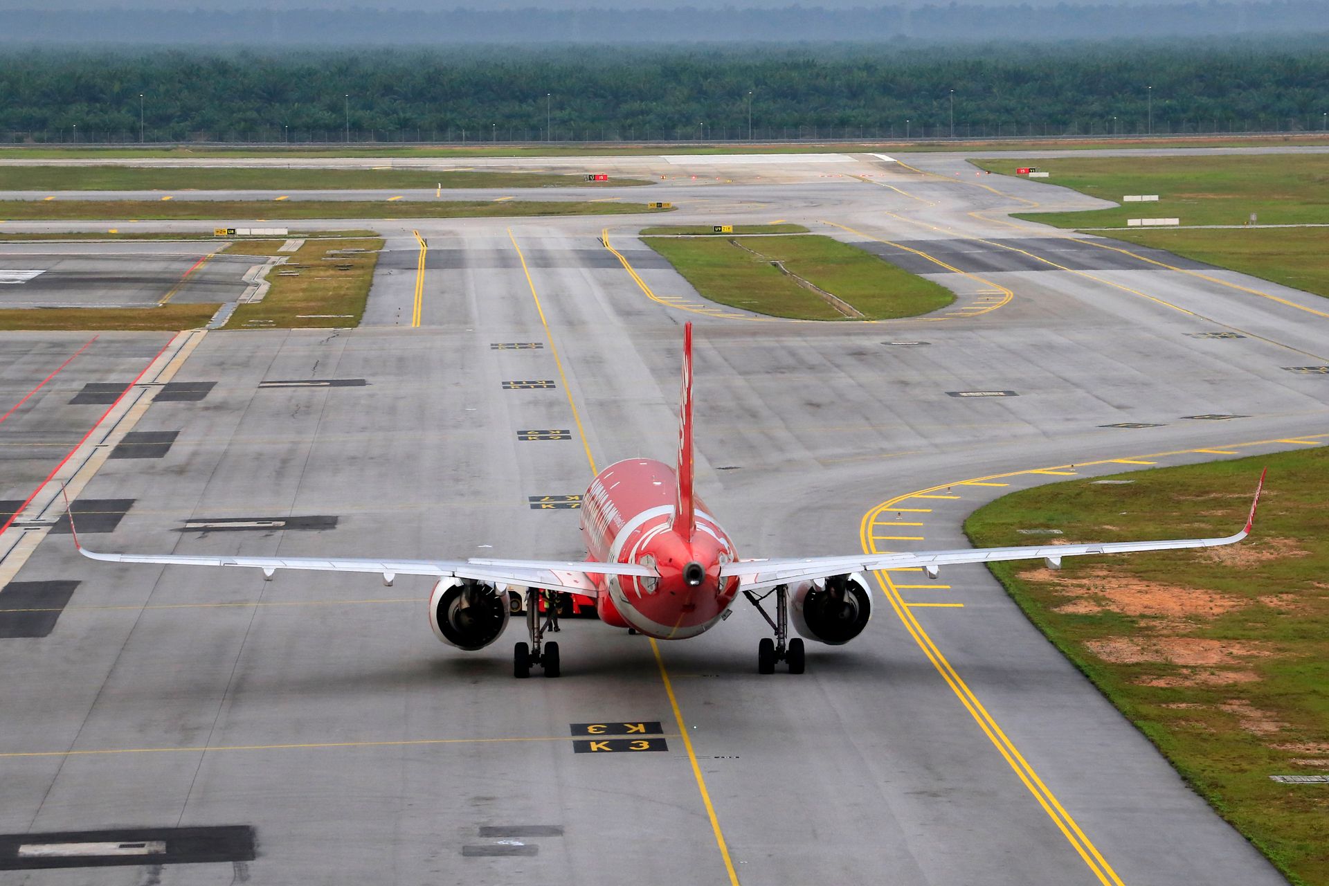 Red Airplane on Tarmac