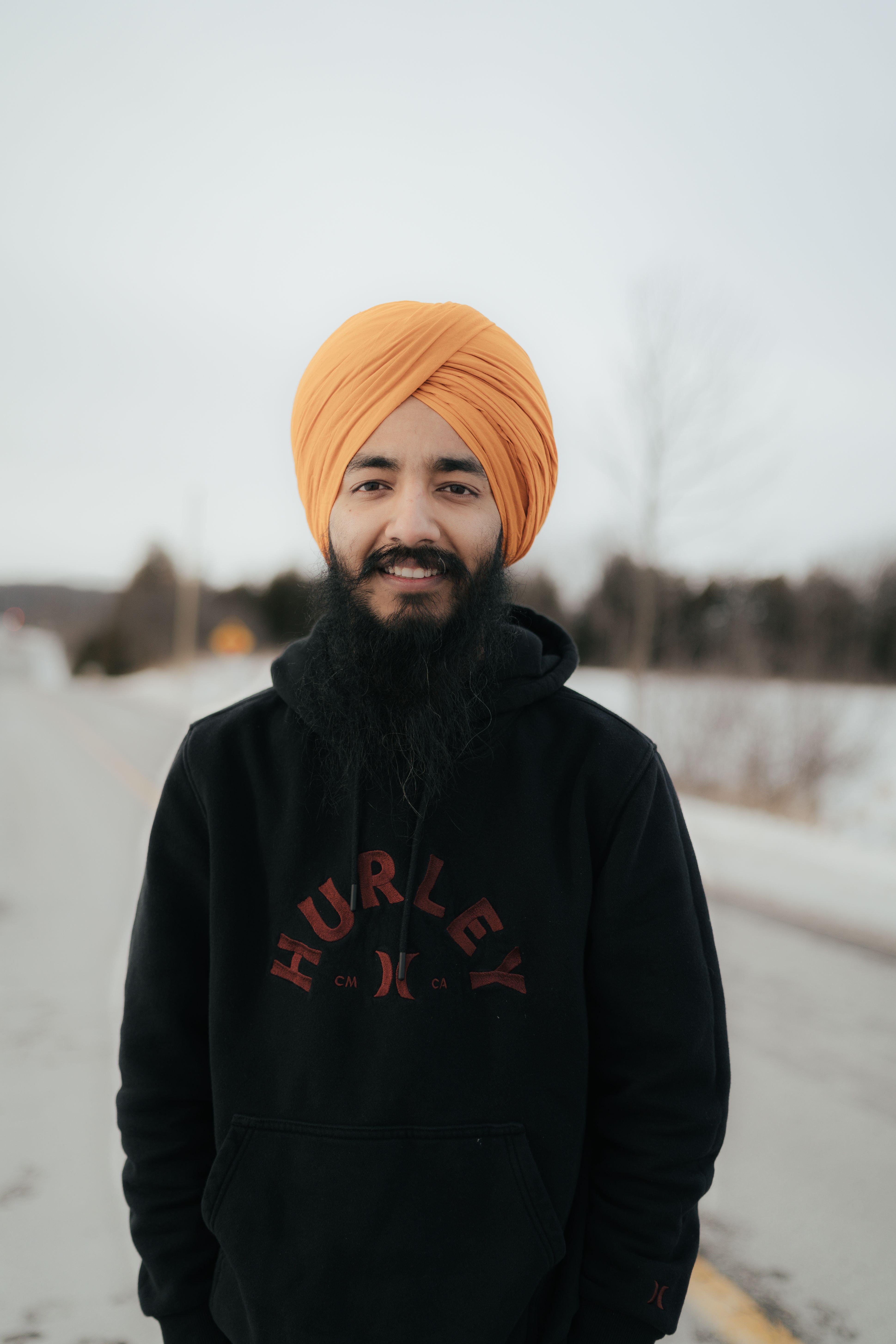 Man Wearing Turban on a Road in Winter · Free Stock Photo