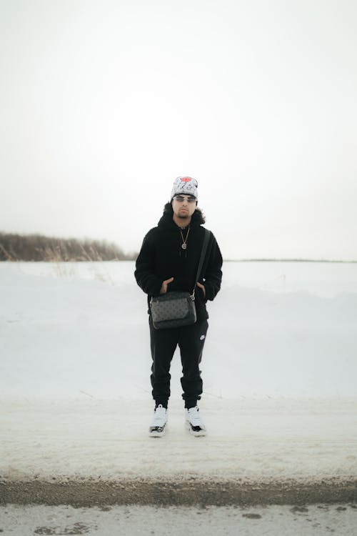 Man on Road in Winter