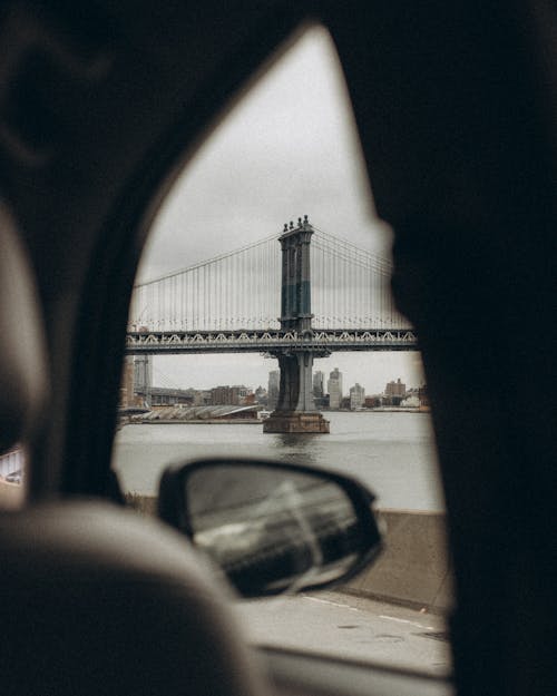 Brooklyn Bridge behind Car Window
