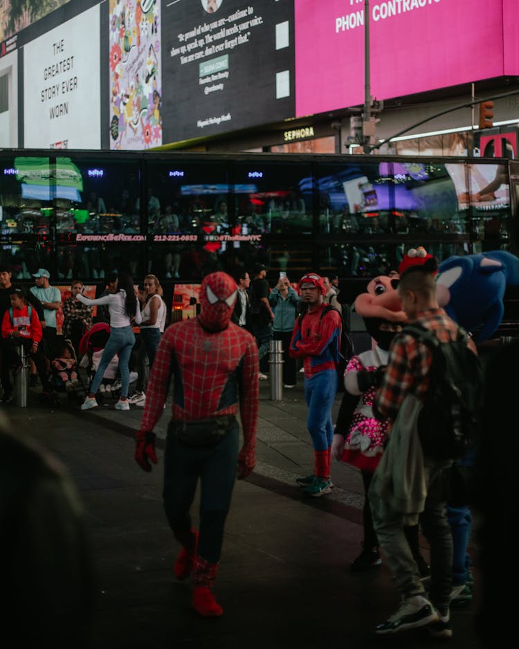 Man In Spiderman Costume In City