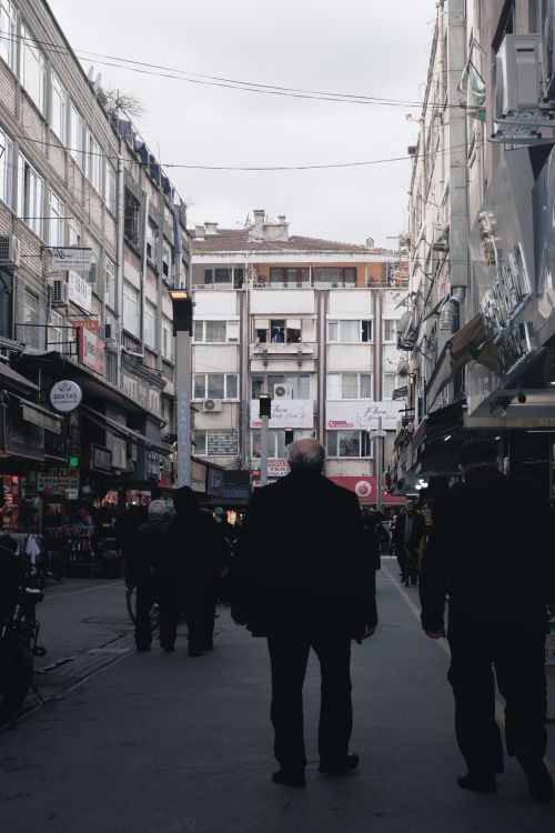 Free A bustling street view in Sakarya, Turkey, showcasing everyday urban life with pedestrians and buildings. Stock Photo