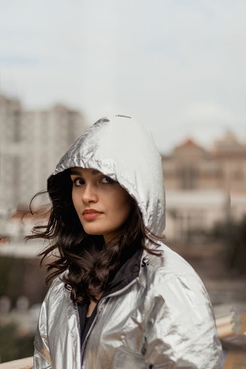 Free Woman Wearing Silver Hooded Jacket Stock Photo