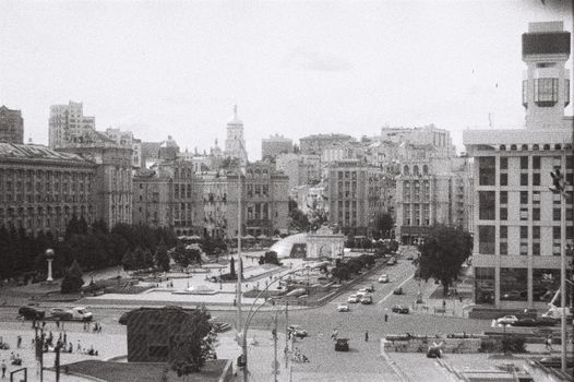 Aerial view of Kyiv's iconic architecture in black and white photo.