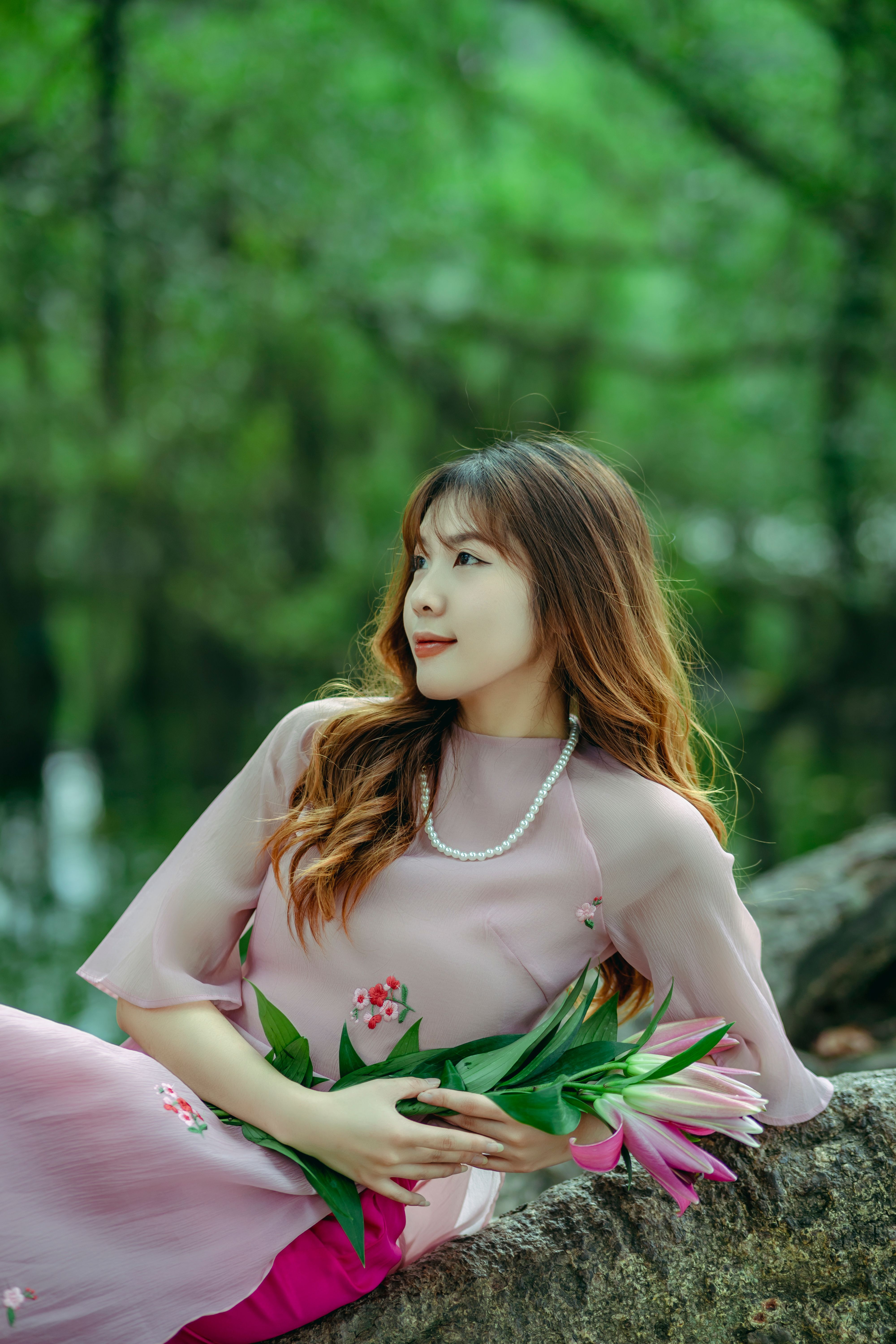 A Young Woman in a Pink Dress · Free Stock Photo