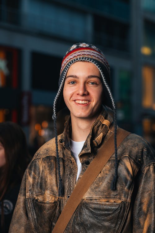 Smiling Man in Leather Jacket