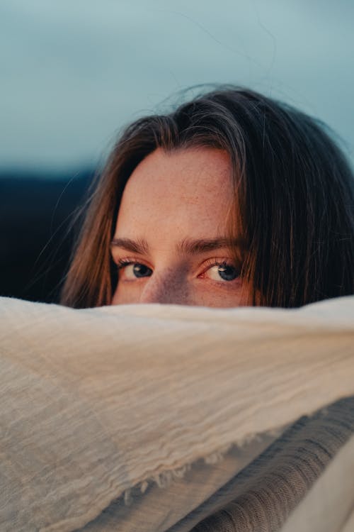 Woman Face behind Scarf