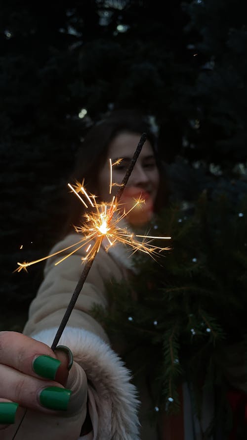 Woman Hand Holding Sparkler