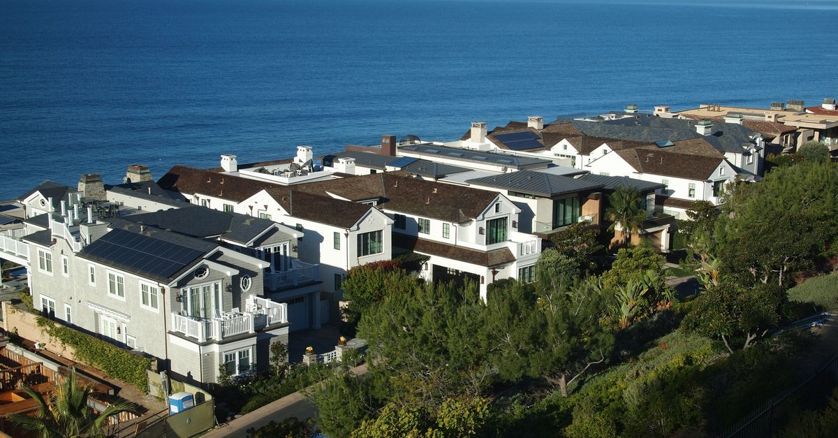 Stunning aerial view of coastal homes and the ocean in Dana Point, California.