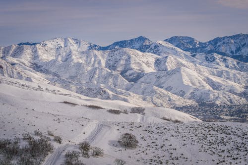 Mountain Valley Covered with Snow 