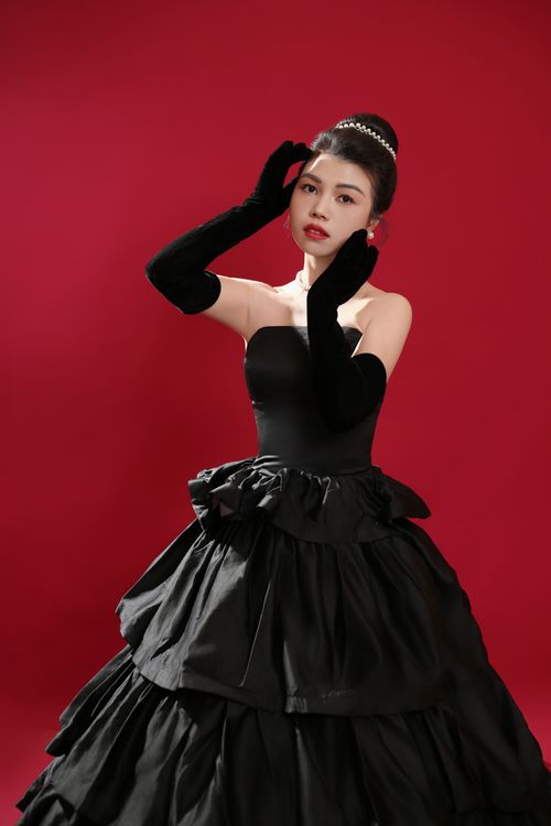 Woman in Black Dress and Gloves  Free Stock Photo