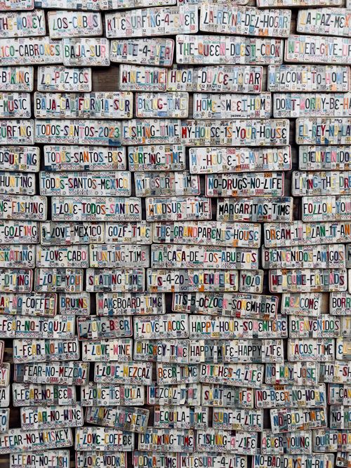 Free A vibrant collection of personalized license plates in Todos Santos, Mexico. Stock Photo